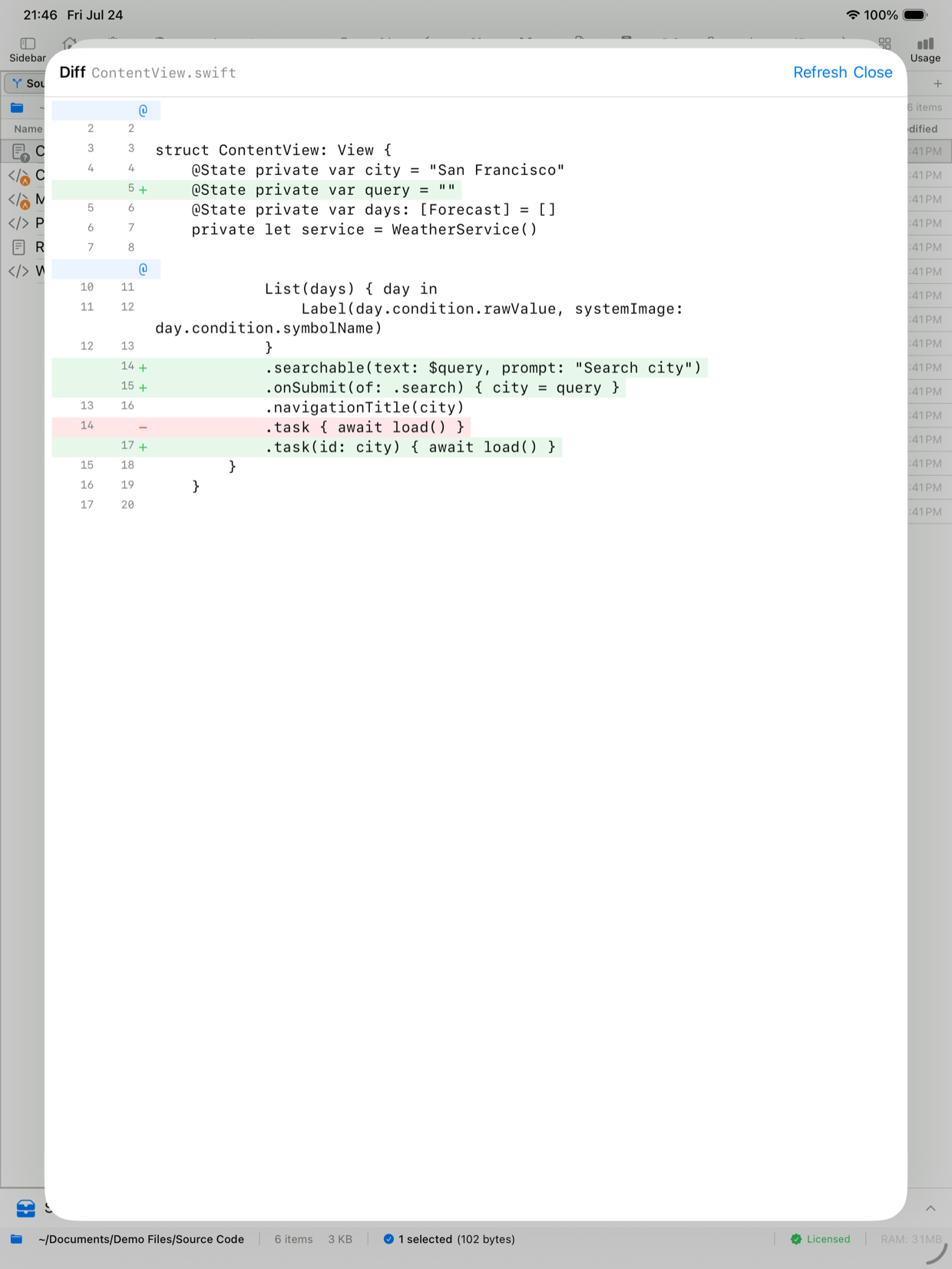 Side-by-side diff of a Swift file on iPad, with added and removed lines highlighted