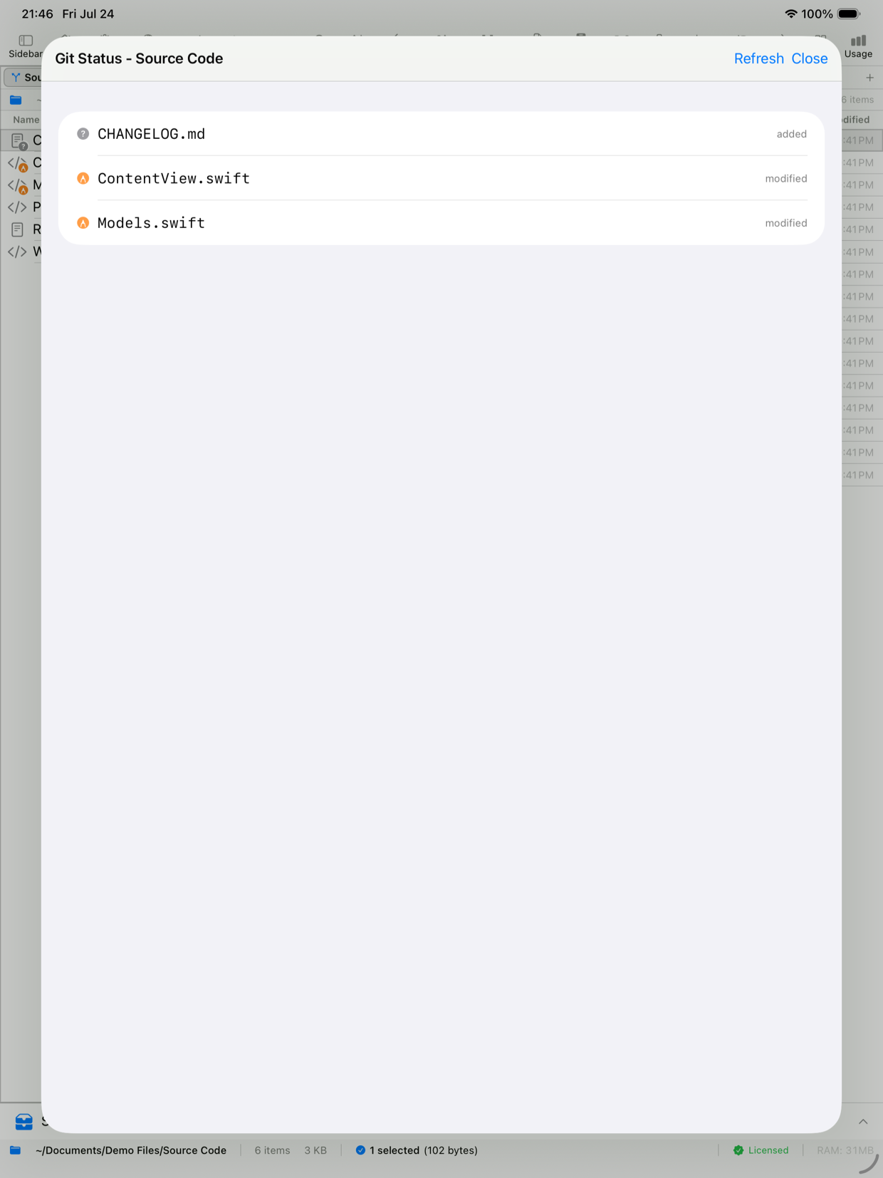 Git status view on iPad showing added and modified files in a cloned repository
